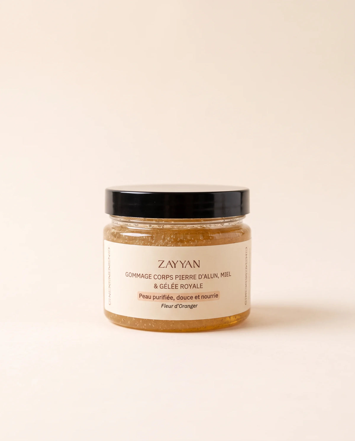 Gommage corps Zayyan à la pierre d'alun, au miel et à la gelée royale, parfum fleur d'oranger, pot en verre de 170 g
